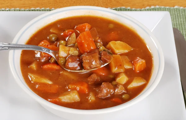 Spoonful of beef stew — Stock Photo, Image
