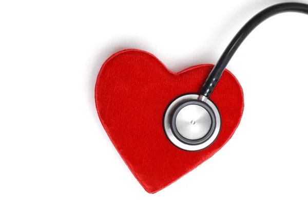 Stethoscoop op een rood hart — Stockfoto
