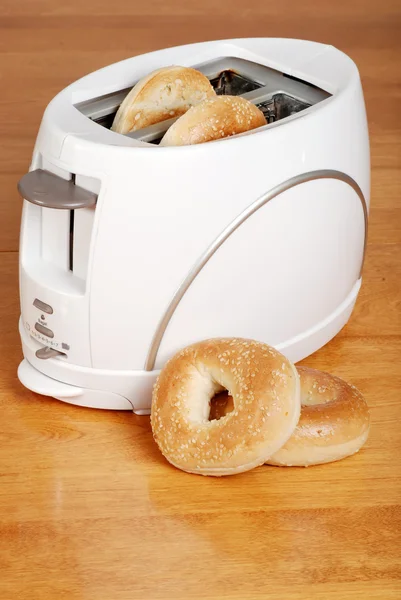 Toaster with bagels — Stock Photo, Image