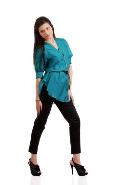 Hispanic woman wearing black pants and blue top clipart