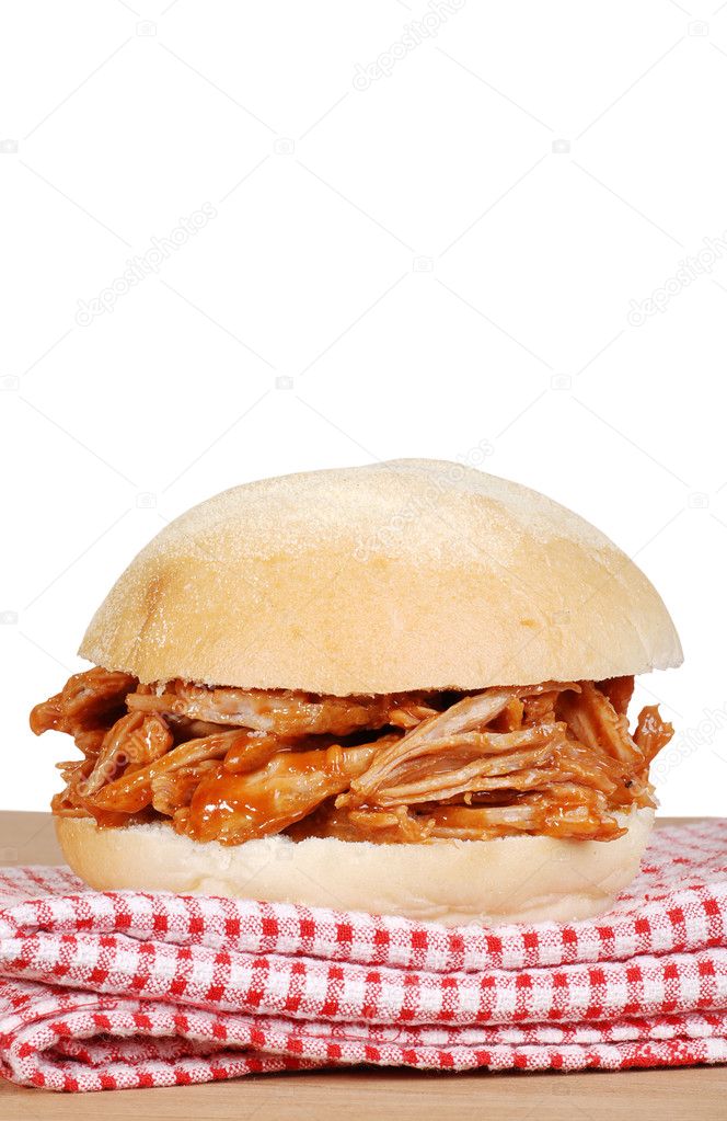 Isolated pulled pork sandwich on white background
