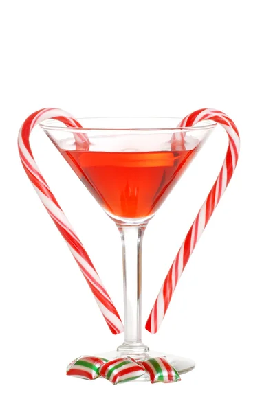 Red martini with christmas candies — Stock Photo, Image