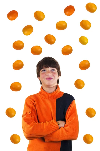 De jongen met sinaasappelen — Stockfoto