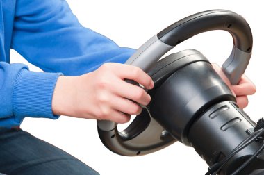 Using new motion controlled video game sensor in stearing wheel. clipart