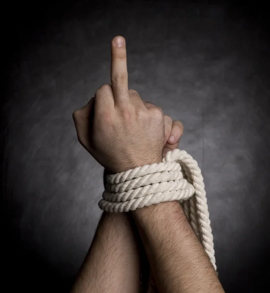 Handen met een touw — Stockfoto