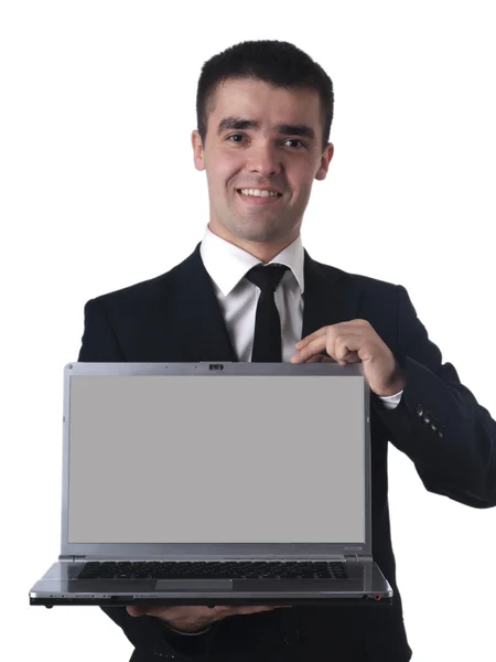 Мужчина бизнесмен в костюме с ноутбуком в руках — стоковое фото