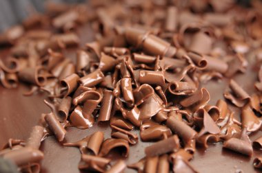 Macro from a chocolate dessert with chocolate rasps clipart