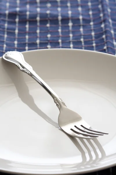 Вилка и тарелка — стоковое фото