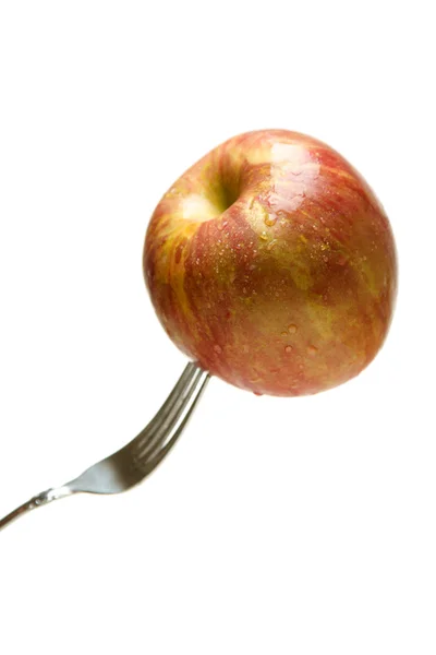 Manzana en tenedor —  Fotos de Stock