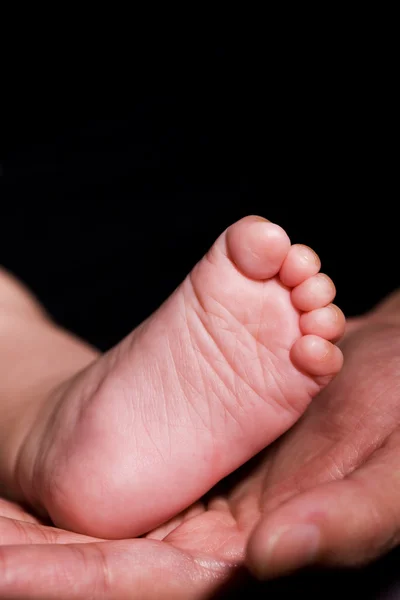 Τα πόδια του μωρού — Stockfoto