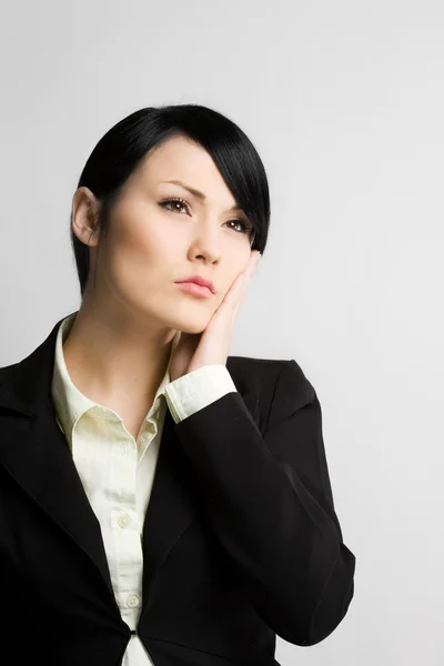 Daydreaming businesswoman — Stock Photo, Image