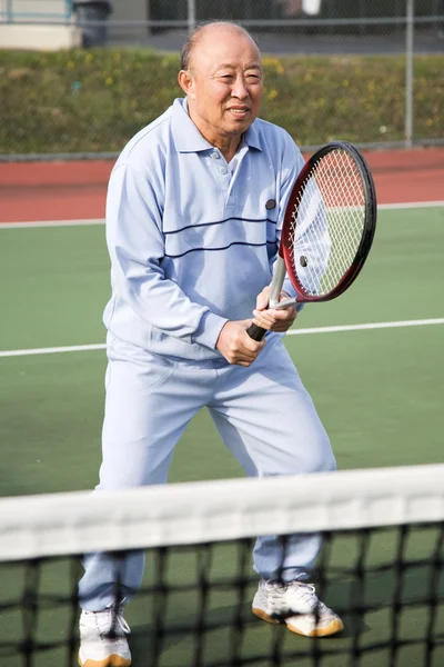 Senior tennisser — Stockfoto