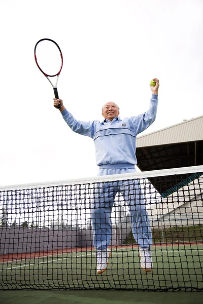 Senior tennis player — Stock Photo, Image