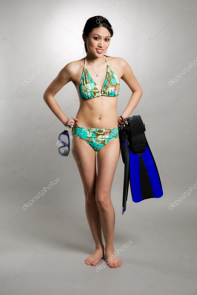 Asian woman in bikini Stock Photo by ©aremafoto 5091532
