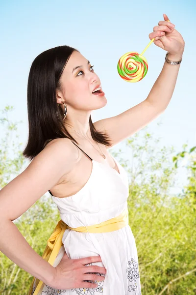 Woman and lollipop — Stock Photo, Image