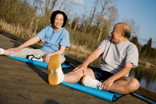 Asian senior couple exercise — Stock Photo, Image