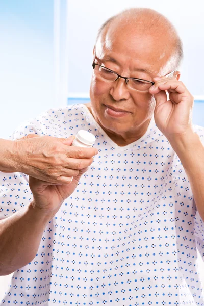 Starší asijské zdravotní péče — Stock fotografie