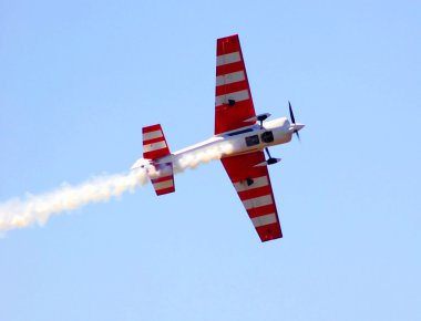 A jet plane at an air show clipart