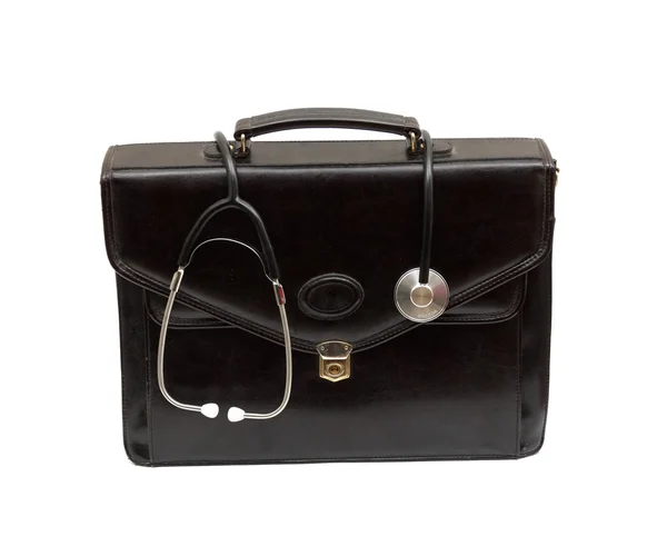 Old brown leather doctors bag and stethoscope — Stock Photo