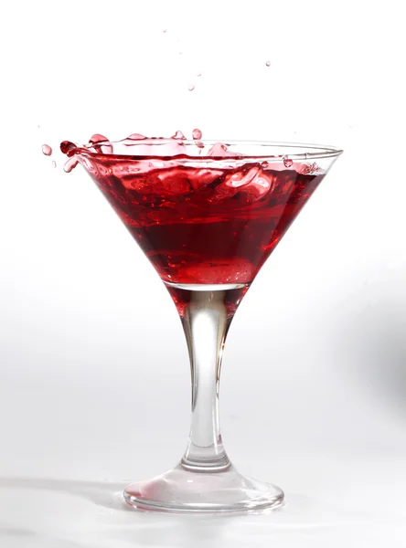 Red martini cocktail splashing — Stock Photo © merznatalia #5236710