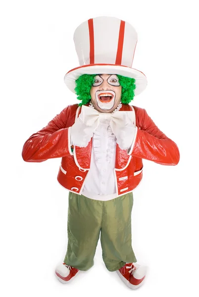 Der lustige Clown schaut in die Kammer und korrigiert eine Verbeugung. — Stockfoto