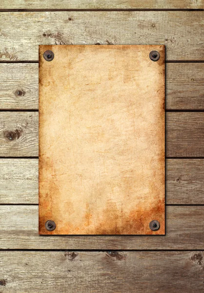 Vintage page on a wooden wall — Stok fotoğraf