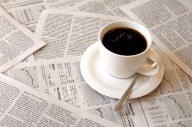 Coffee over newspaper clipart