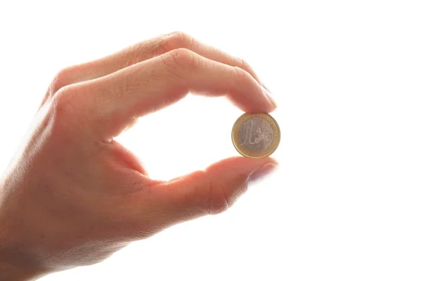 Mano sosteniendo un euro — Foto de Stock