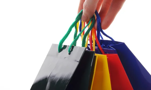Mão levar um saco de compras — Fotografia de Stock