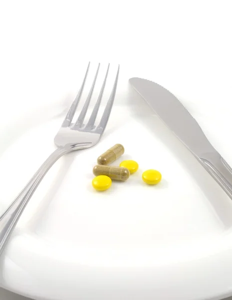 Їжа таблеток — стокове фото