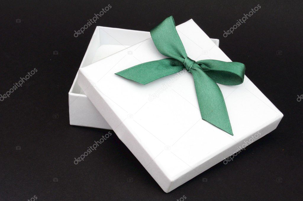 White gift with green ribbon