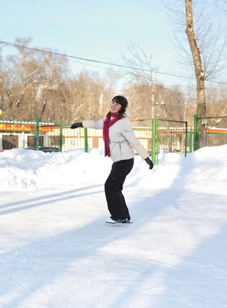 Girl on winter skate rink — Stock Photo, Image
