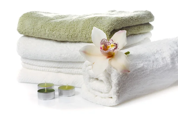 Stack of towels with orchid flower — Stock Photo, Image