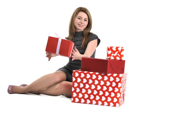 Chica joven atractiva con cajas de regalo — Foto de Stock