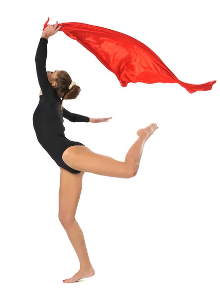 Молодая девушка в спортивной одежде прыгает — стоковое фото
