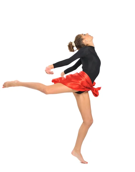Młoda dziewczyna w ubraniach siłownia skoki — Zdjęcie stockowe