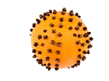 Aromatic Christmas orange with cloves isolated on white background clipart