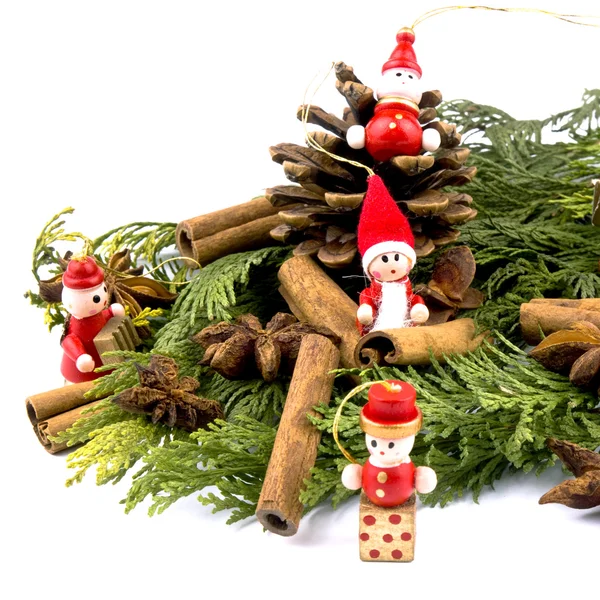 stock image Christmas decoration - thuja branches and red wooden figures