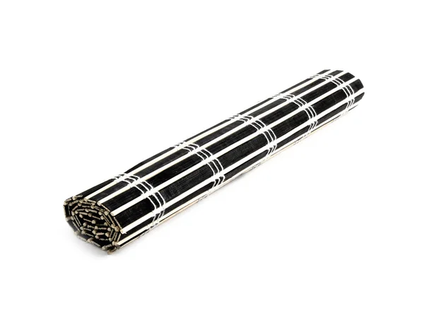 Gerollte schwarze Bambusmatte — Stockfoto