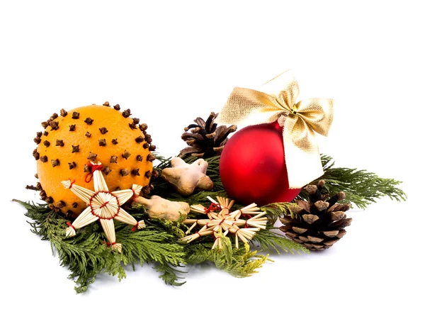 Christmas decoration - orange, glass ball and red wooden figures — Stock Photo, Image