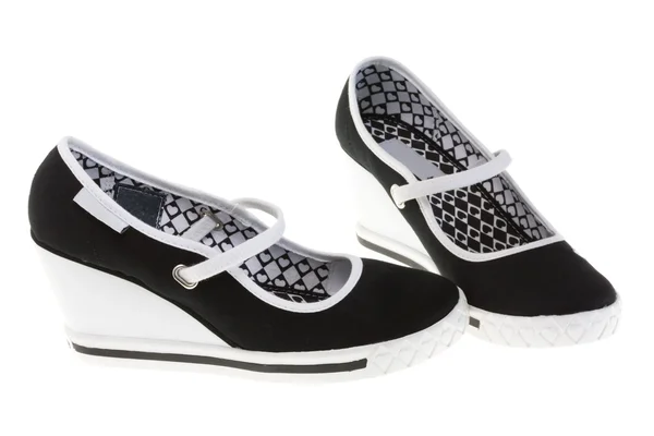 Sapatos de meninas em branco. — Fotografia de Stock