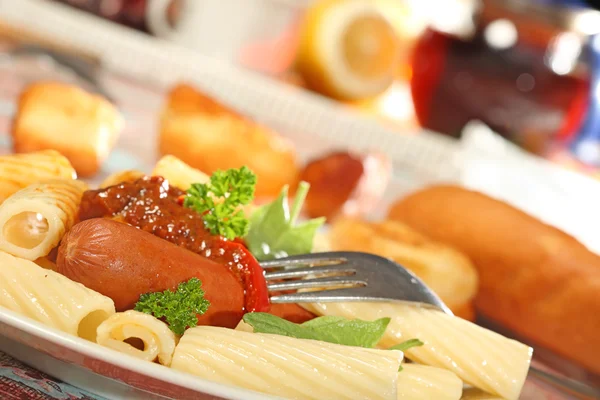 Macaroni with sausage. — Stock Photo, Image