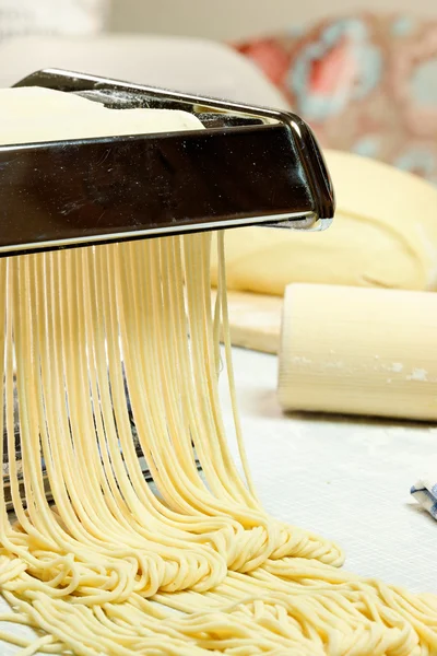 stock image Simple homemade noodles and pasta machine.