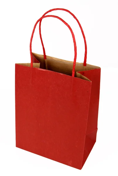 Rote Geschenktüte auf weiß — Stockfoto
