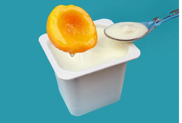 Yogurt Fruit Blue Background — Stock Photo, Image