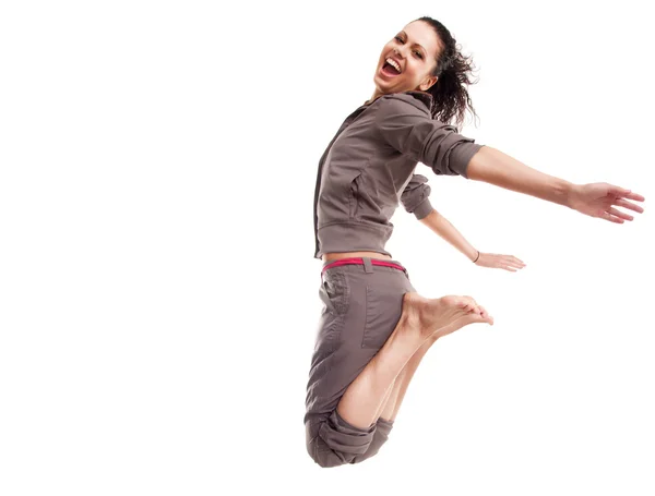 Sport jonge vrouw springen en vliegen — Stockfoto