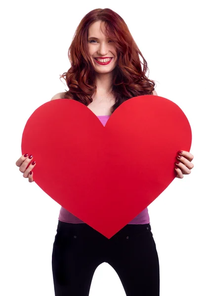 Valentines den. žena držící Valentýn srdce znamení s policajtem — Stock fotografie