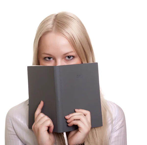Jovem mulher bonita com um caderno — Fotografia de Stock