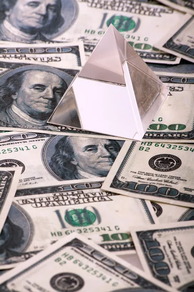 Pyramid on dollars. macro close-up — Stock Photo, Image