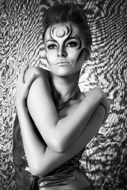 Portrait of beautiful woman with silver bodyart - bw image clipart